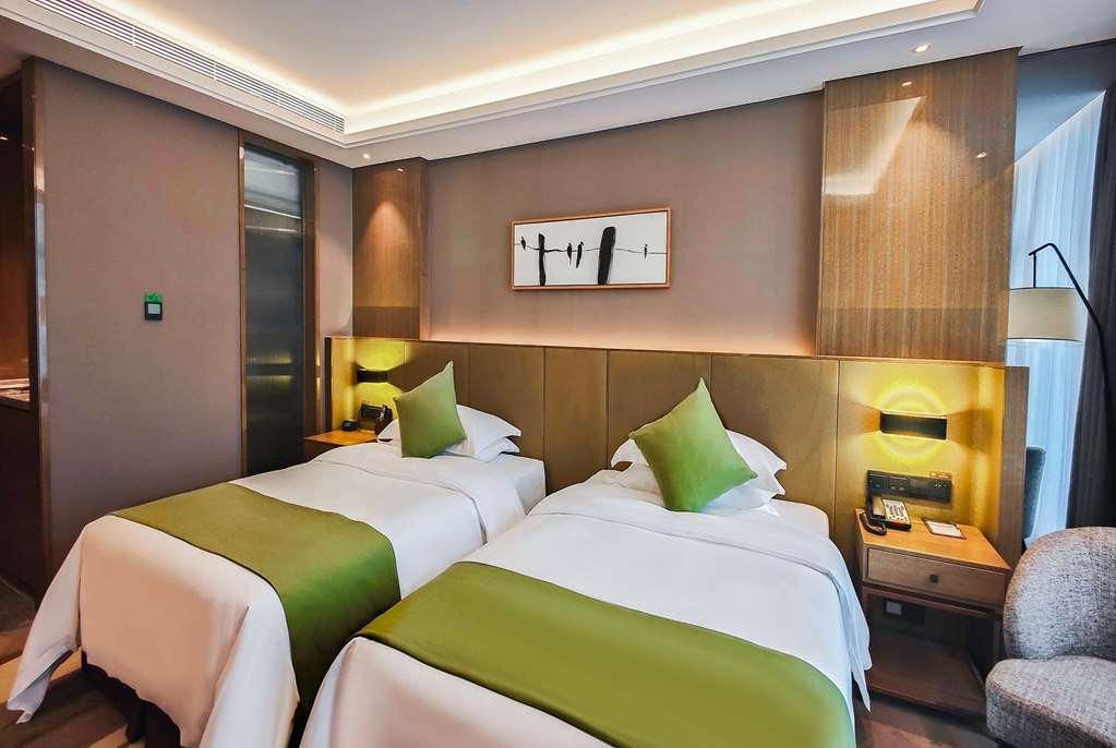 Leshan Ramada Hotel Zimmer foto